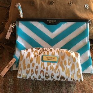 A pair of Victoria’s Secret make up bags.